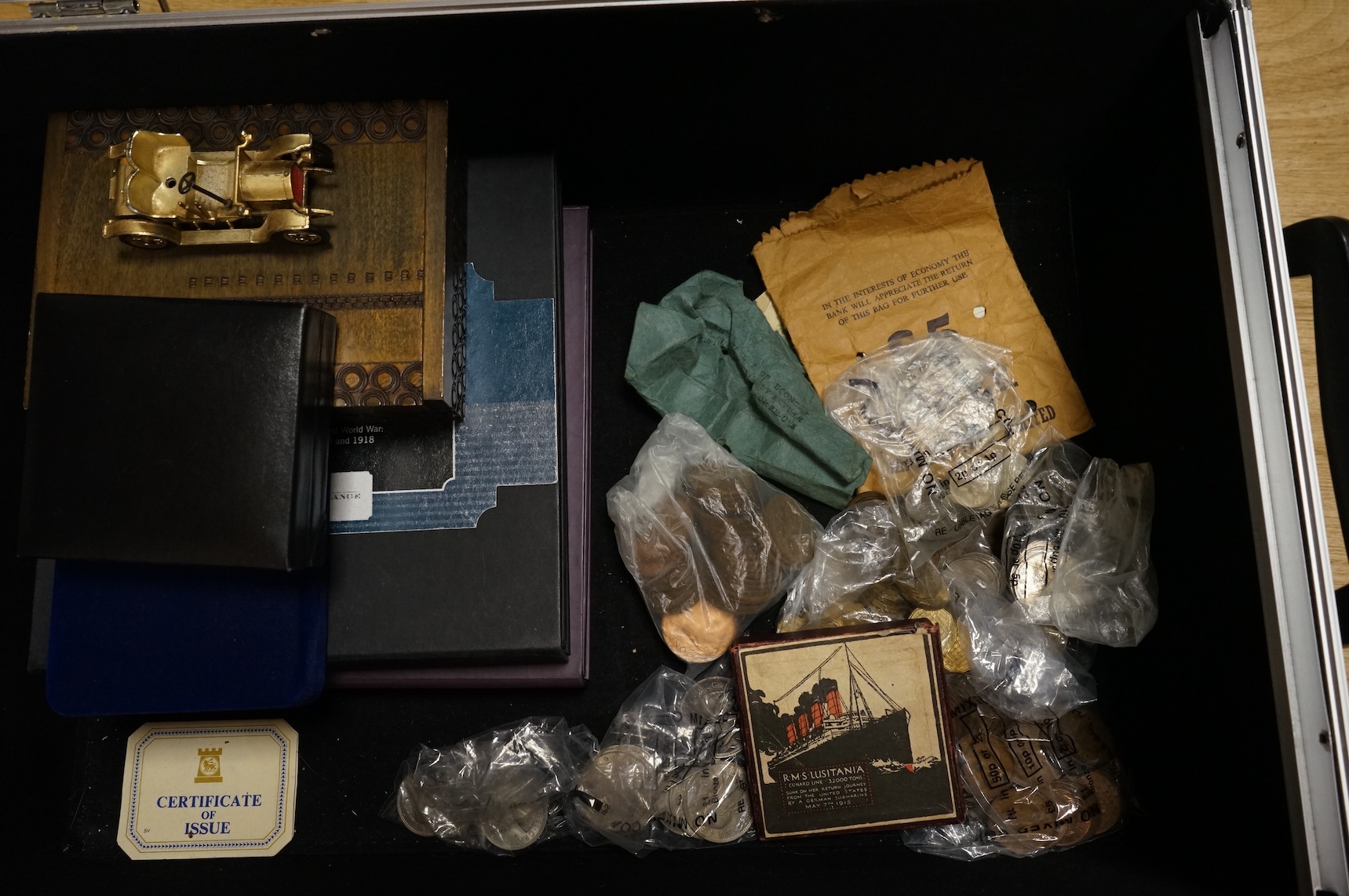 A collection of coins, etc.